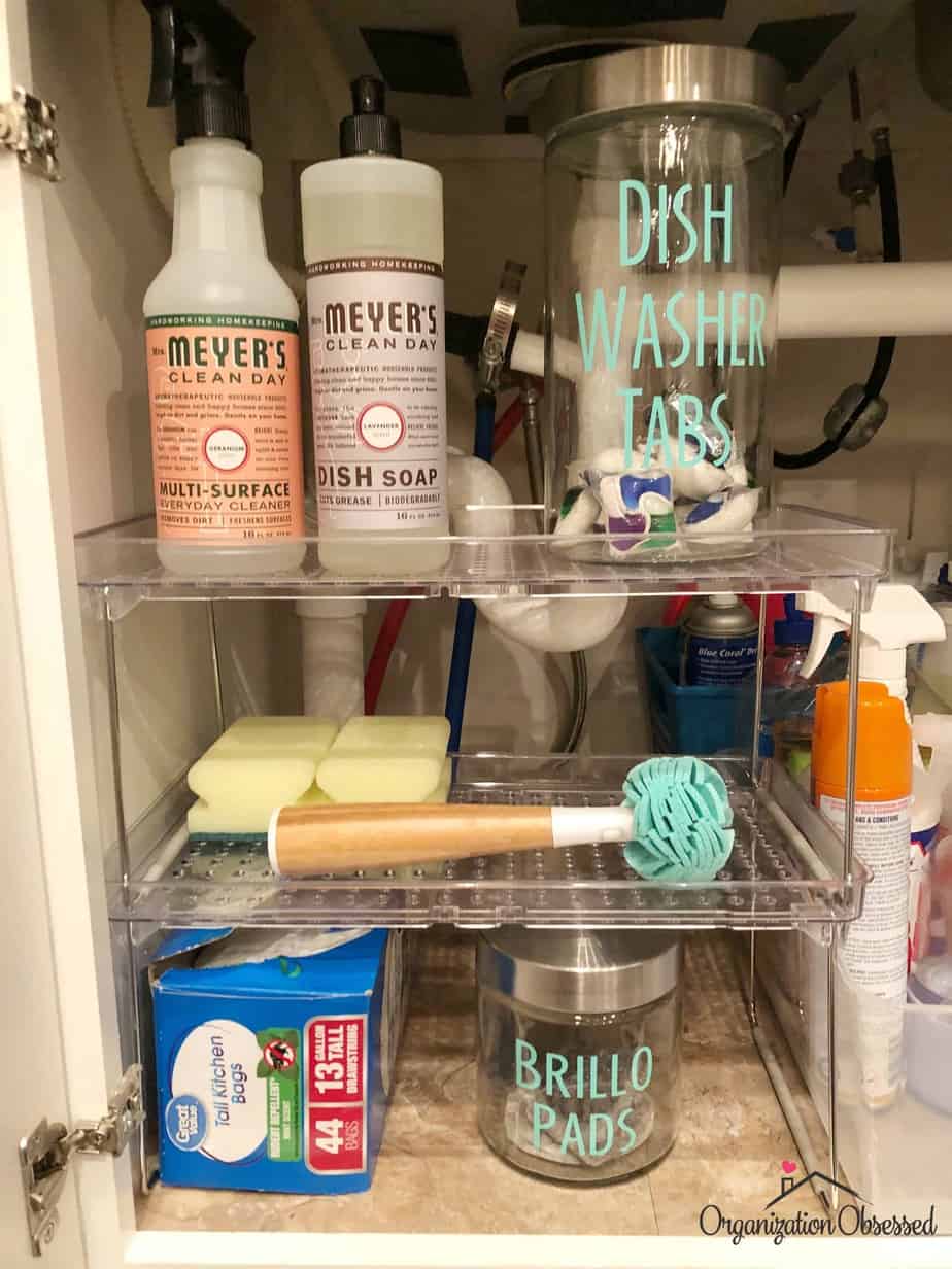 How To Organize Under The Kitchen Sink - Organization Obsessed