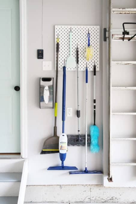 DIY Garage Pegboard Organizer For Brooms And Cleaning Supplies