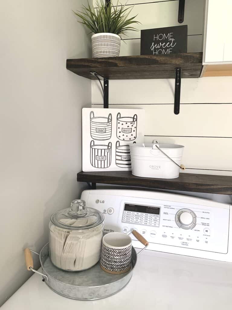 Laundry room dryer sheet storage and change jar